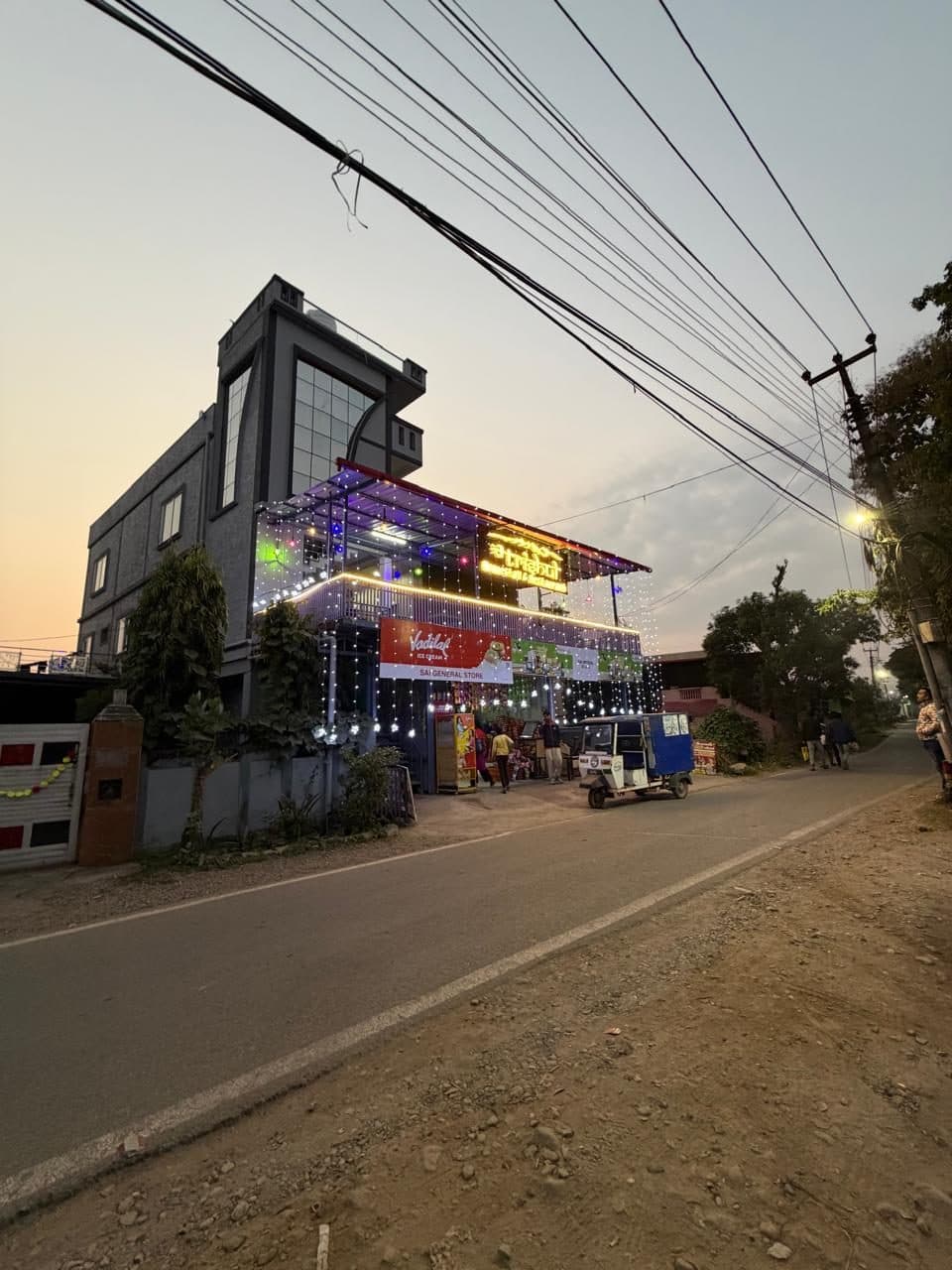 The homestay building at the roadside in evening light